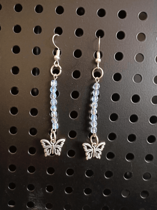Boucles d&#039;oreilles longues papillon 